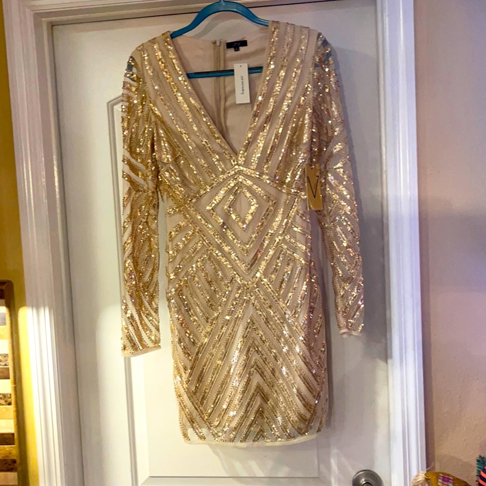 Francesca’s gold sequined dress. Never worn. Size large. Tags in place.